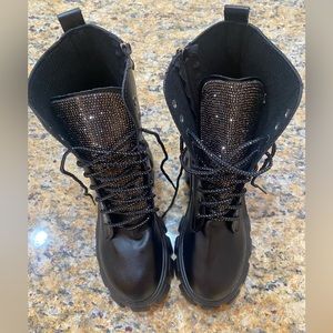 BRAND NEW black combat boots with rhinestone tongue and sparkle laces.